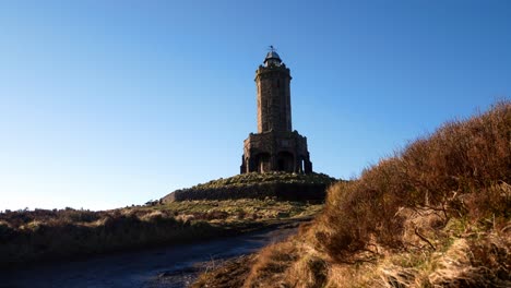 Darwen-Jubilee-tower-historic-landmark-colourful-highlands-moorland-heather-countryside-dolly-right