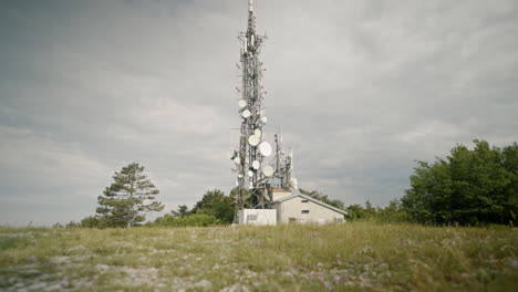 Pan-camera-towards-the-radio-tower,-low-perspective