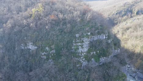 Aerial-movement-around-mountain-cliff-during-winter-in-Caucasus-mountains-Georgia
