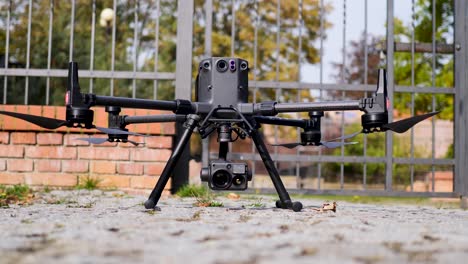 large-drone-taking-off-from-ground---static-steady-shot