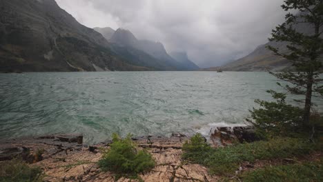 Stormy-weather-at-the-base-of-St-Mary-lake-in-Glacier-National-Park,-Montana