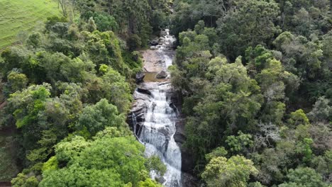 Lush-waterfall-filmed-with-drone,-nature-and-jungle