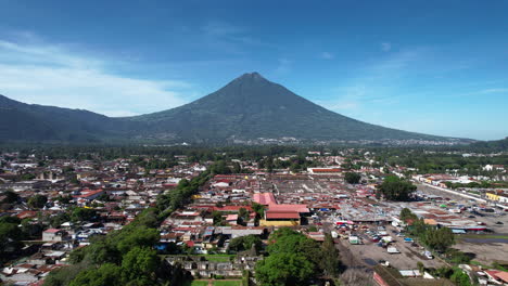 Aerial-view-of-Antigua-Guatemala-by-DJI-air2s-drone-flying-latterly-above-the-city,-revealing-beautiful-architecture-and-landscape-of-the-city