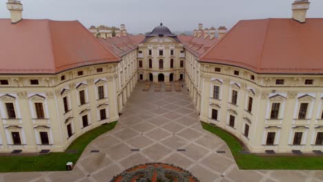 Aerial-Drone-Of-Historical,-Symmetrical-Patterned-Architecture-Of-Slavkov-Castle,-Czech-Republic