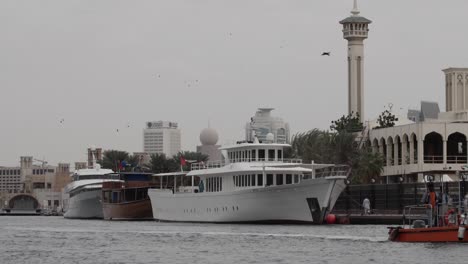 Boat,-yacht-on-old-Dubai-river-in-the-middle-east-in-United-Arab-Emirates