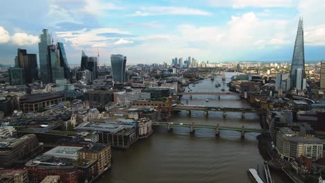 Cinematic-Aerial-View-of-Downtown-London-UK,-Thames-River,-Skyscrapers-and-Cityscape-Skyline