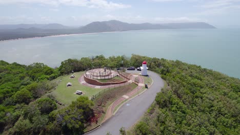 Lush-Green-Trees-Around-The-Grassy-Hill-Lookout-And-Cooktown-Light-Overlooking-The-Calm-Blue-Sea-In-Australia