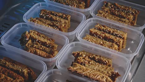 Slices-Of-Healthy-Vegetarian-Food-Snacks-Placed-On-Plastic-Containers
