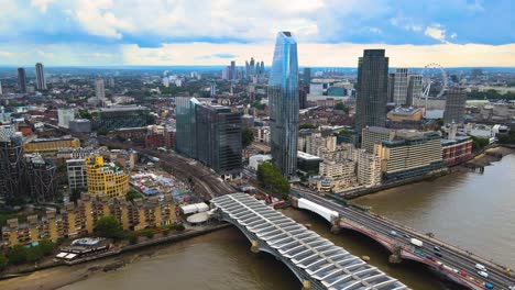 Aerial-View-of-London-UK,-Blackfriars-Towers,-Neighborhood-and-Bridges-Above-Thames-River,-Hyperlapse