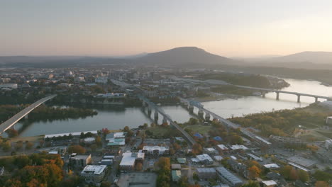 Super-wide-aerial-footage-of-the-four-bridges-spanning-over-the-Tennessee-River-in-downtown-Chattanooga