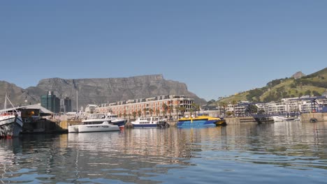 Yachts-and-boats-in-Cape-Town-Harbour,-view-from-water-on-a-clear-day