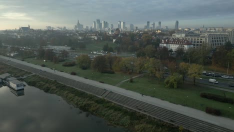 Aerial-view-from-the-boulevard-by-the-Vistula-River-of-the-modern-centre-of-Warsaw-with-its-skyscrapers