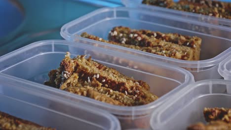 Freshly-Bake-Snack-Bars-With-Mix-Veggies-Stored-In-Containers