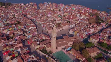 Burano-village-famous-for-colorful-houses,-view-of-church-Saint-Martin-and-square,-aerial