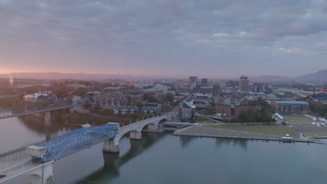 Wide-aerial-footage-rotating-around-the-Market-Street-Bridge-in-downtown-Chattanooga-during-the-sunrise