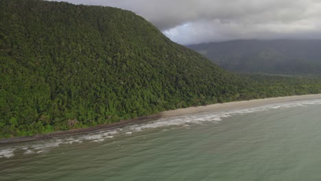 Scenic-Beach-And-Mountains-At-Daintree-National-Park-In-Far-North-Queensland,-Australia---aerial-drone-shot