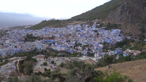 A-wide-view-from-the-mountain-of-the-blue-city-of-Chefchaouen,-Morocco