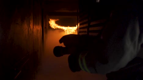 Slow-motion-view-of-fire-in-building-and-smoky-hallway
