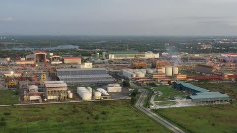 Aerial-view-capturing-PGEO-edible-oil-refinery-food-processing-centre-and-sapura-energy-fabrication-yard-at-lumut-port-industrial-park,-Kampung-Acheh,-Sitiawan,-Perak,-Malaysia