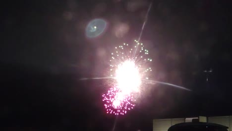 Low-angle-shot-of-firework-in-the-sky-during-the-night-time