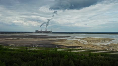 Dark-Smoke-Rising-From-Smokestacks-Of-Industrial-Mining-Plant
