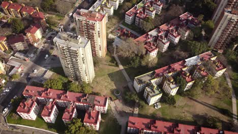 A-dynamic-tilting-aerial-footage-of-the-colorful-apartment-buildings-and-condominium-towers-at-the-Castex-neighborhood-in-Buenos-Aires,-Argentina