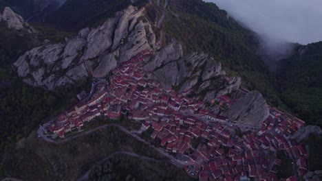 Pietrapertosa-idyllic-mountain-village-at-dawn,-aerial
