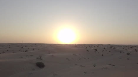 Wide-drone-sunset-over-Arabic-desert