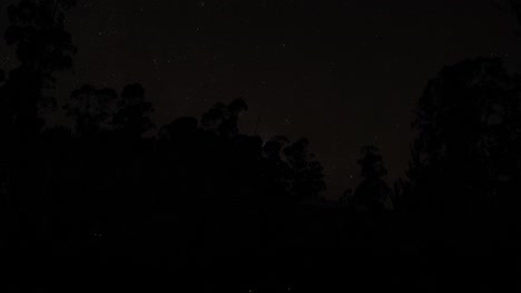 A-stationary-timelapse-footage-of-a-country-home-in-a-rural-community-going-lights-out-while-the-stars-show-up-in-the-sky