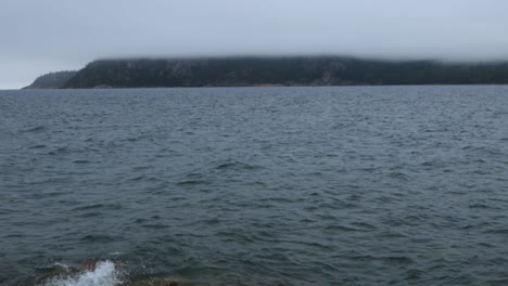 Handheld-shot-of-the-rocky-Lake-Superior-shore-in-Ontario