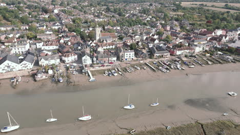 High-viewpoint-aerial-footage-of-Wivenhoe-Village-in-Essex,-looking-down-with-sideways-motion