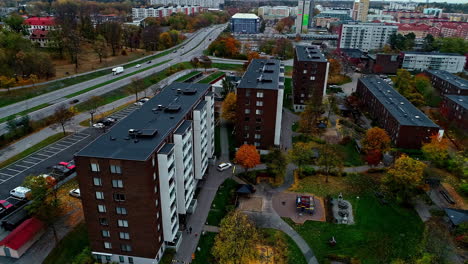 Residential-Buildings-and-Highway-During-Autumn-In-Stockholm,-Sweden