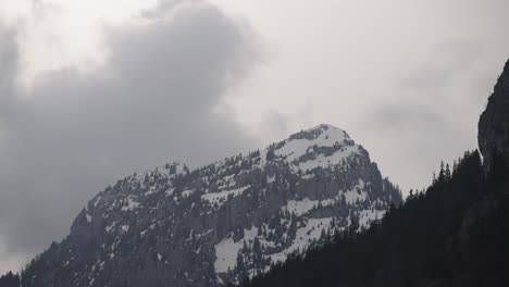 Snowy-rocky-mountains-with-cloudy-weather