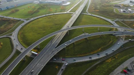 An-aerial-view-a-large-roundabout-on-the-outskirts-of-the-city-with-several-bridges-for-cars-and-trucks-no-traffic