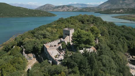 Aerial-circling-shot-of-venetian-castle-in-Butrint-archeological-site