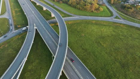 A-aerial-view-a-country-highway-with-bridges-on-which-cars-drive