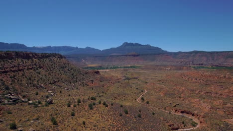 Drone-shot-of-mountain-range-located-in-Mount-Zion-Southern-Utah