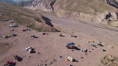 Aerial-View-Of-Tourist-Camping-Near-Hot-Spring-Valley-In-Termas-Colina-Near-Santiago,-Chile