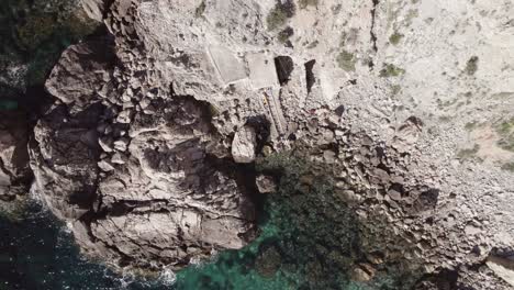 Close-up-shot-of-rocks-and-stones-on-cliff-and-mountain-in-Ibiza