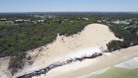 Beach-And-Sand-Dunes-In-Rainbow-Beach,-Queensland,-Australia---aerial-drone-shot
