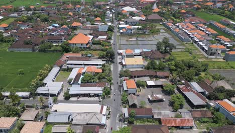 Drone-view-of-Indonesian-housing-and-street-in-Sukowati,-Gianyar,-Bali