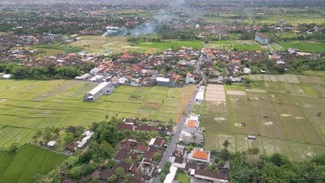 Drone-top-view-Indonesian-housing-and-transportation,-Batubulan,-Gianyar,-Bali