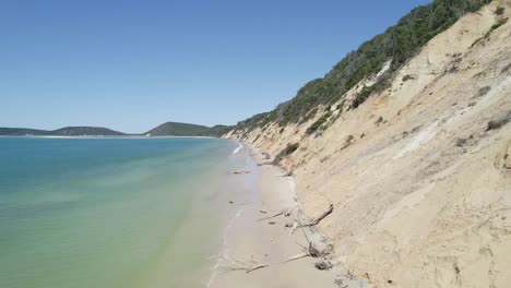 Rainbow-Beach-With-Scenic-Turquoise-Ocean-In-Queensland,-Australia---aerial-drone-shot