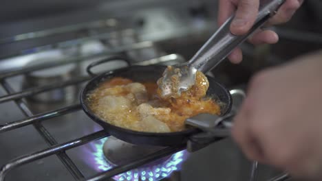 Shoot-cooking-over-high-heat-in-a-frying-pan
