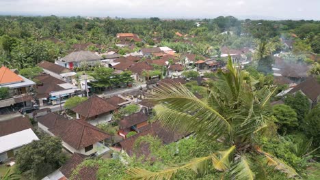 Drone-view-of-Indonesian-housing-and-road-in-Batubulan,-Gianyar,-Bali