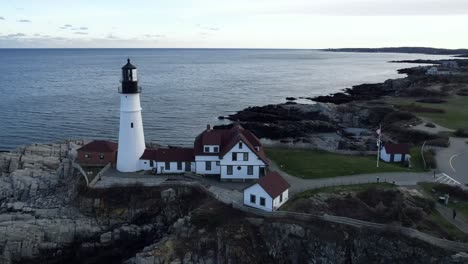 Famous-landmark-of-the-Portland-Head-Lighthouse---ascending-aerial-overlook-in-Maine