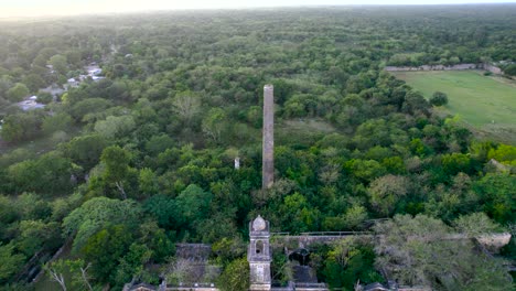 drone-shot-in-receding-chimney-abandoned-hacienda-de-uayalceh-in-yucatan