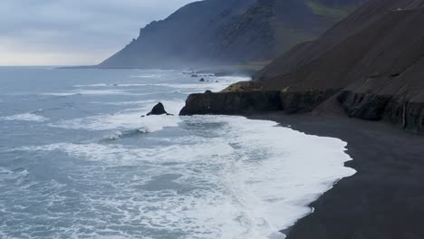 Flying-Through-The-Beautiful-Coastline-Of-Black-Sand-Beach-In-Iceland