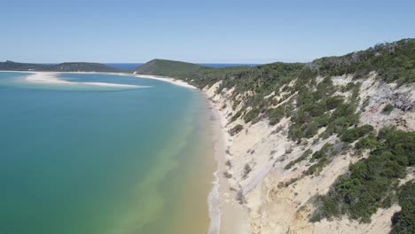Turquoise-Seascape-Of-Rainbow-Beach-In-Queensland,-Australia---aerial-drone-shot