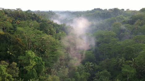Wispy-Clouds-Over-Tropical-Rainforest-Near-Batur-Mountain-In-Bali,-Indonesia